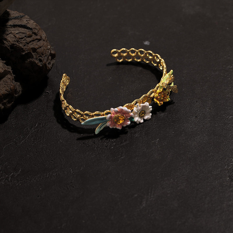 Bee and honeycomb bracelet with flowers