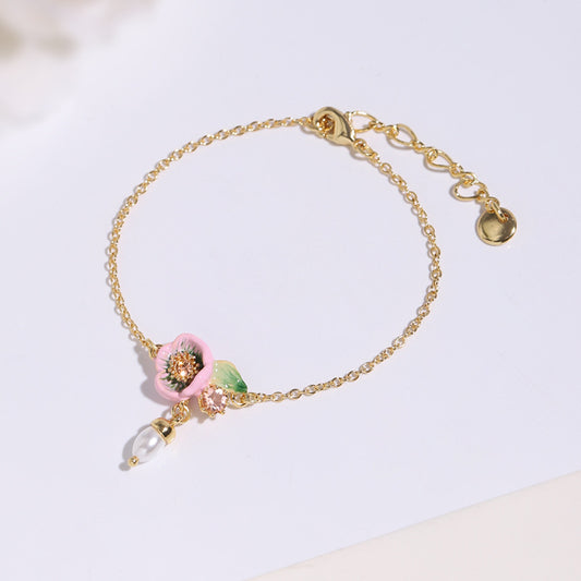 Pink flowers with pearl bracelet