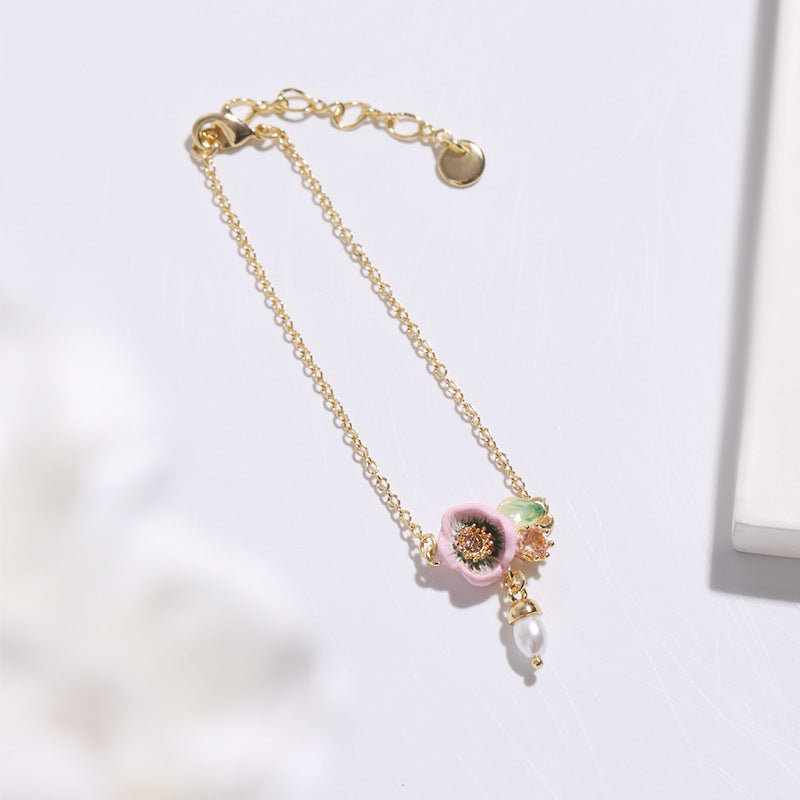 Pink flowers with pearl bracelet
