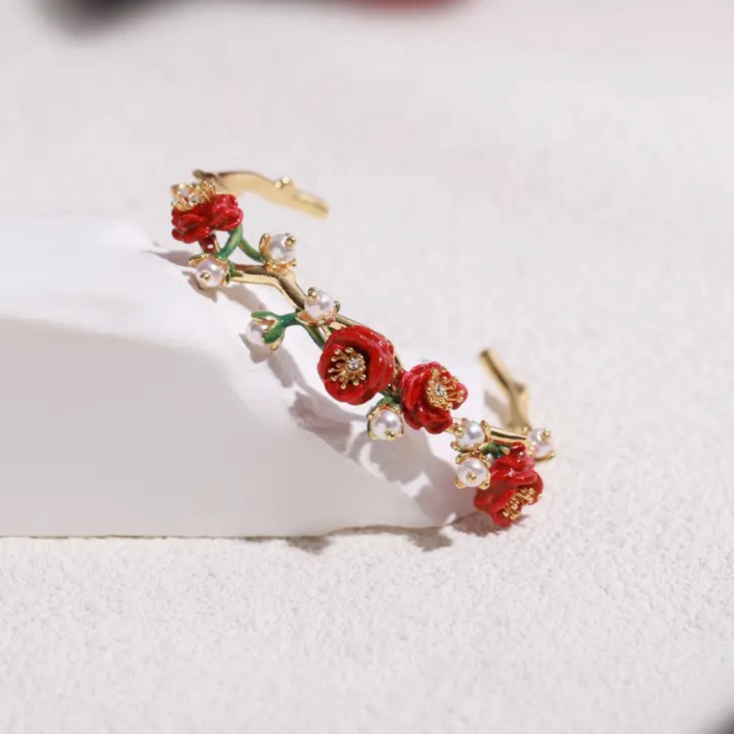 Red rose with pearl bracelet