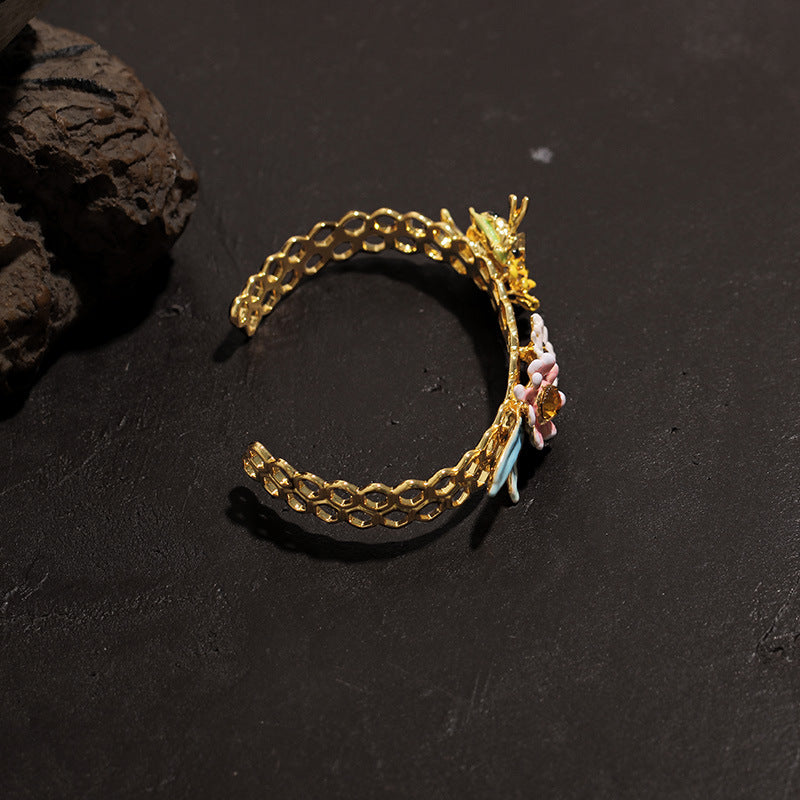 Bee and honeycomb bracelet with flowers