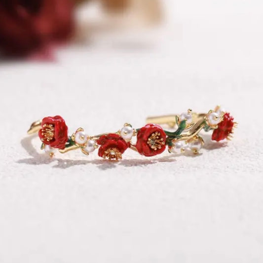 Red rose with pearl bracelet
