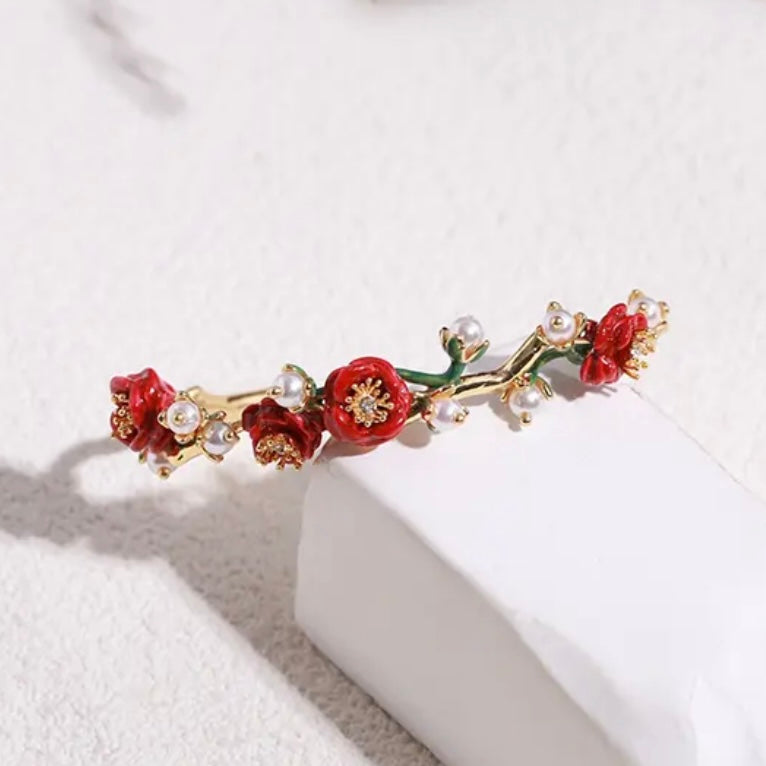 Red rose with pearl bracelet